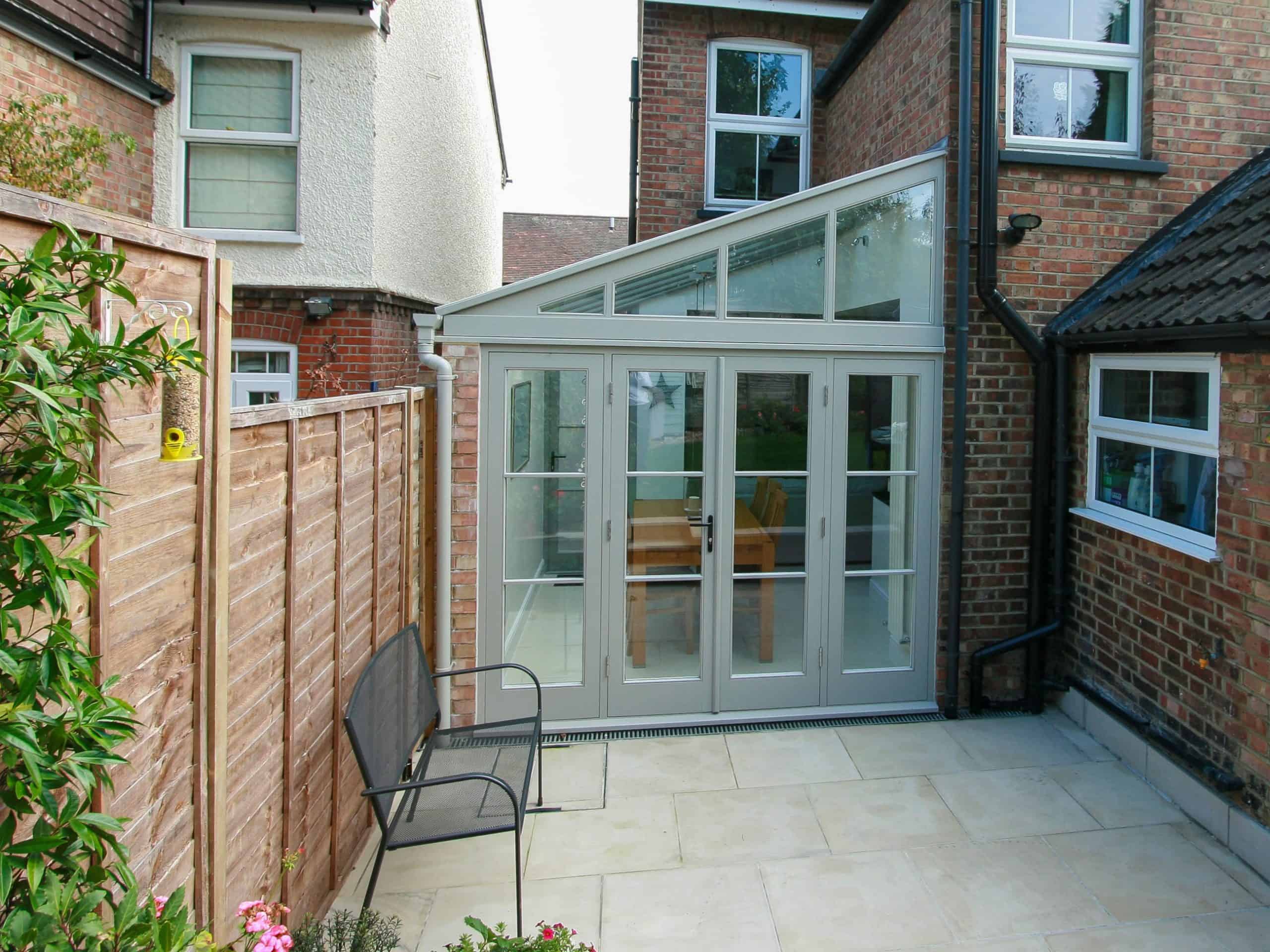 Harpenden conservatory kitchen extension with glazed gable and patio doors