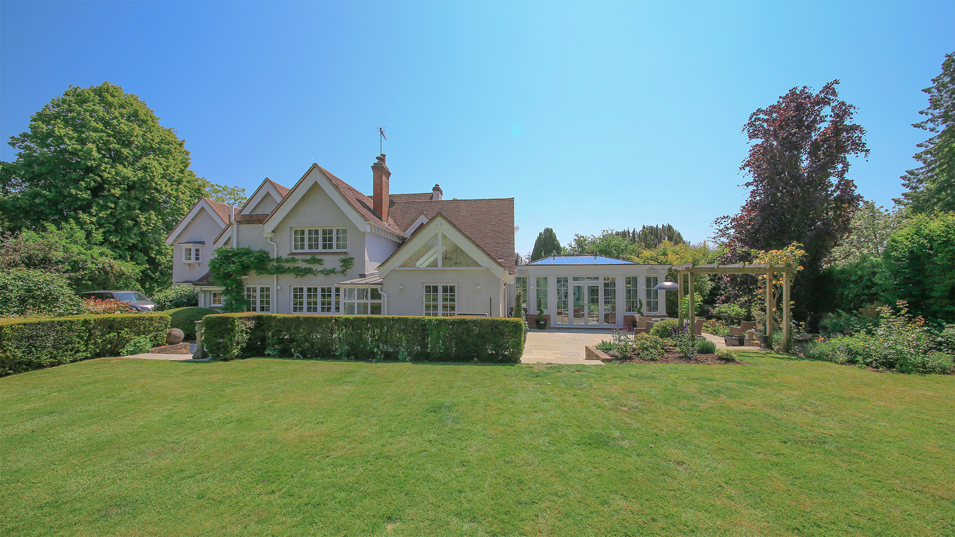 Chorleywood bespoke white orangery - garden view