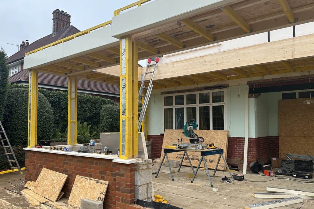Glulam beams, posts and fascia forming the new orangery roof