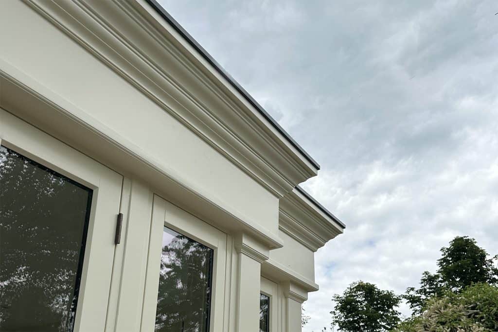 Close-up of the painted timber fascia and pilaster on the Woodhall Park garden room