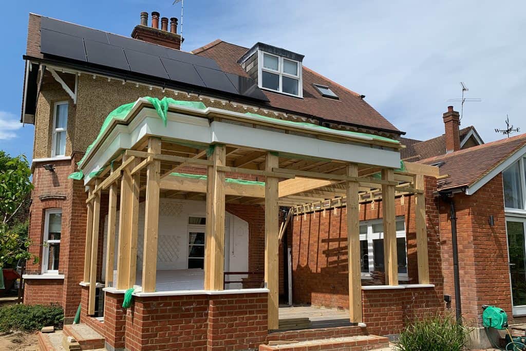 Moulded fascia fitted around the timber orangery roof above the structural posts