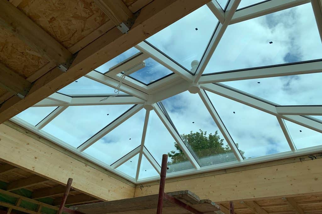 Glazed roof lantern installed above the glulam beams inside the orangery
