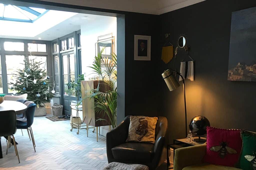 View from the sitting area into the orangery dining room and roof lantern