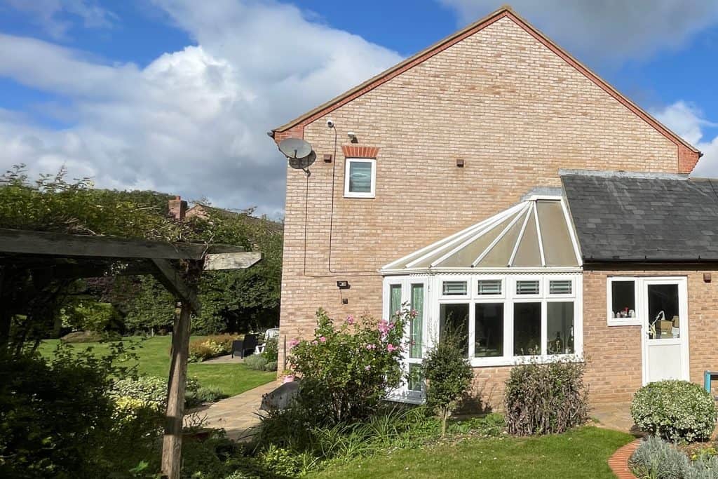Original small conservatory against the rear of the Bedfordshire house