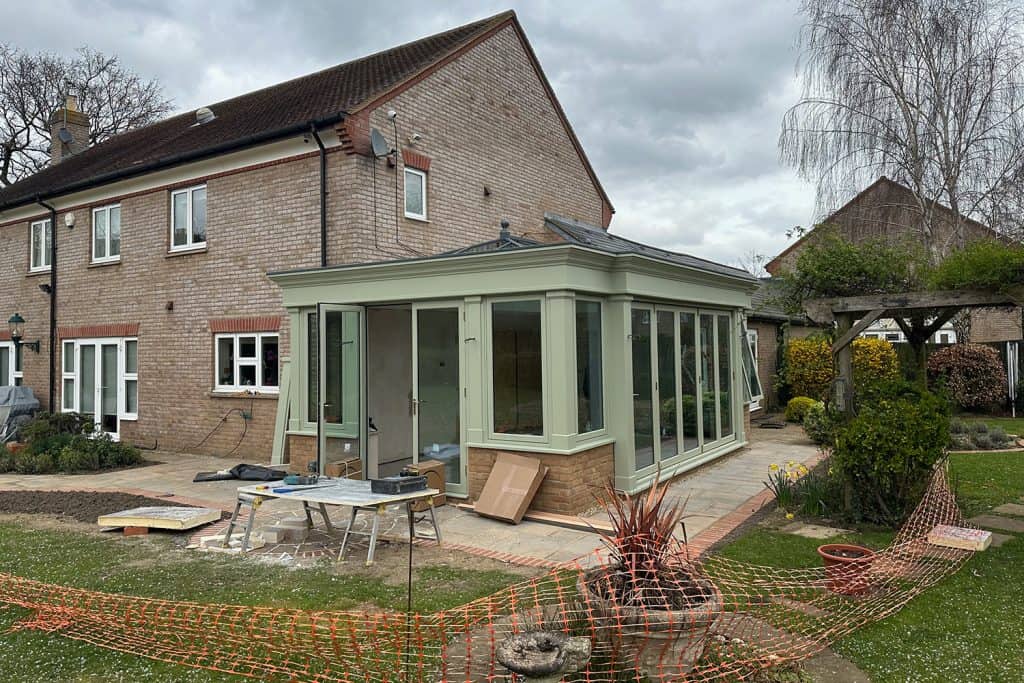 New Bedfordshire orangery with glazing fitted while the patio is finished